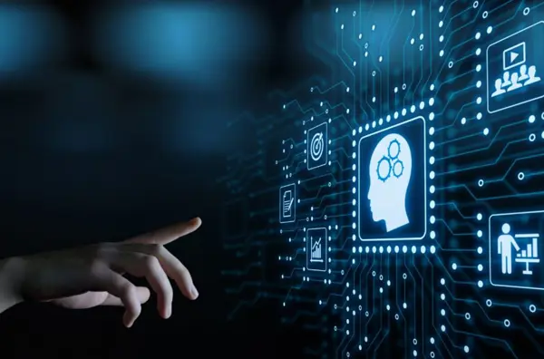 Composited graphic of hand pointing to digitised icons of a head with cogs, a person standing at a desk and a crowd of people under a screen.