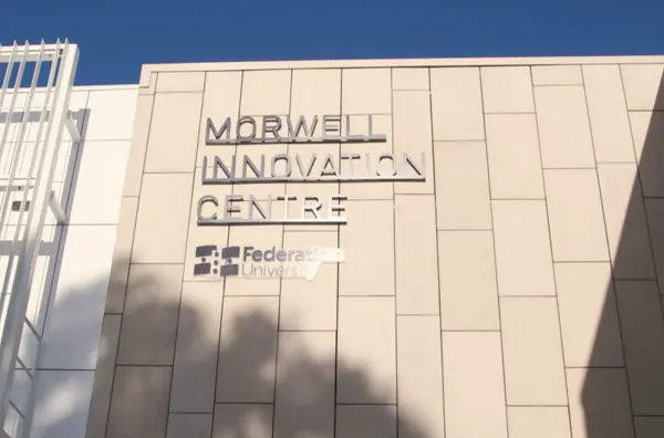 Photo of The Morwell Innovation Centre's signage on an outside building wall.