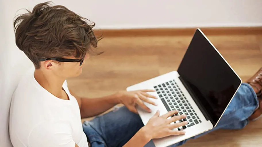 Student on laptop computer