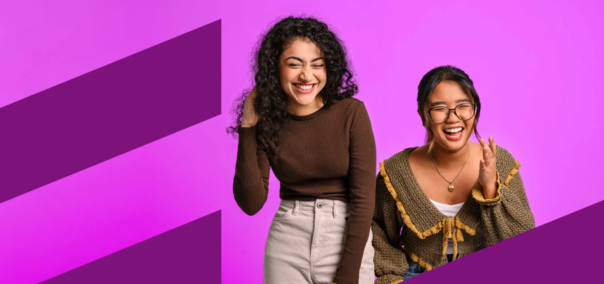 Two students laughing