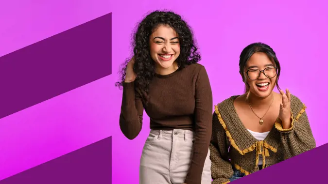 Two students laughing