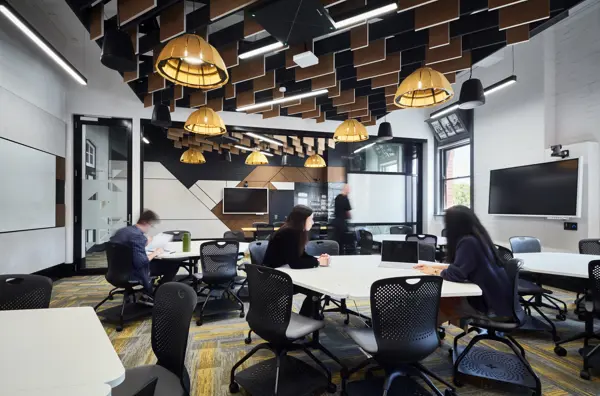 Students sitting in a modern classroom.